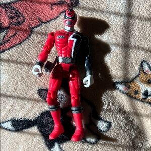 Red and Black Action Figure